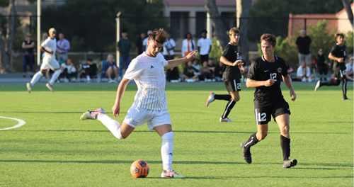 Player Luke Ryan participates in a game with the Concordia men’s soccer team
